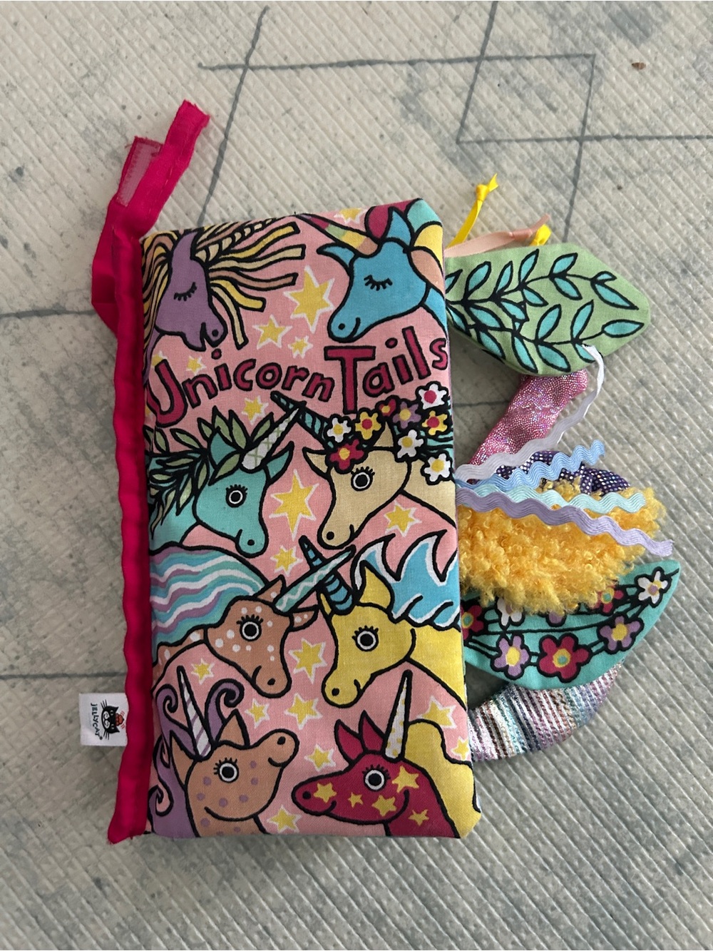 Jellycat Unicorn Tails Colorful Pink Yellow Blue Soft Fabric Activity Book